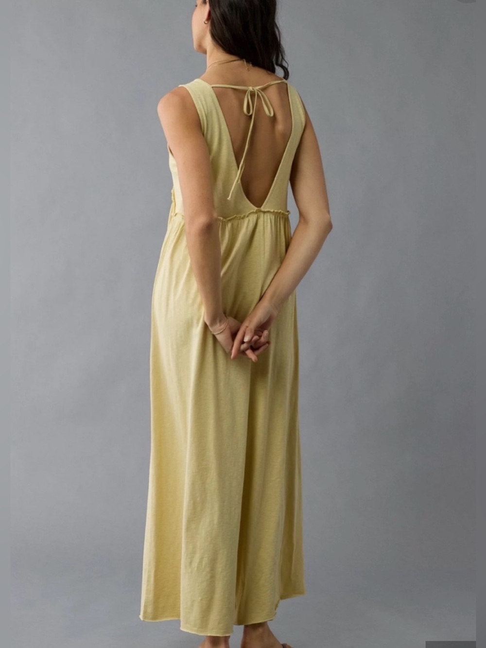 American Eagle Sleeveless V-Neck Wide-Leg Jumpsuit in Light Yellow - Picture 2 of 3